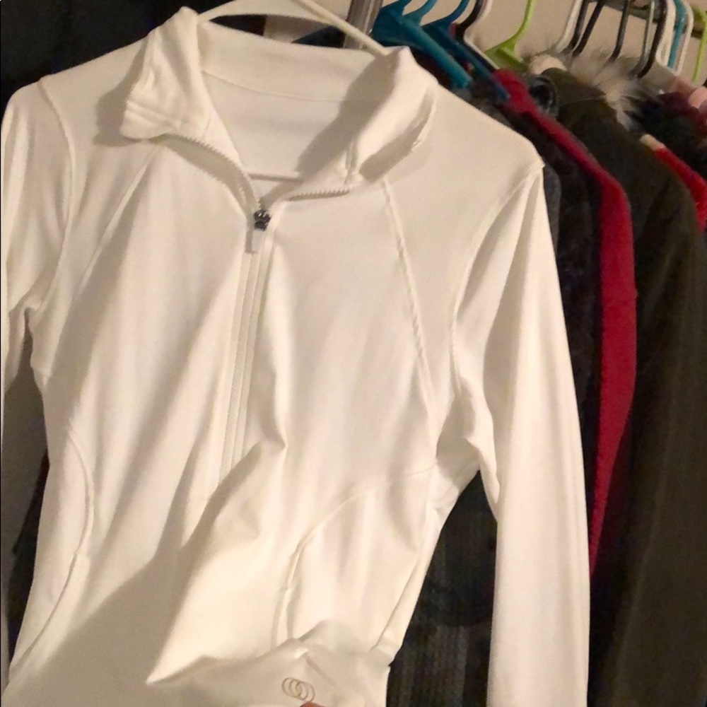 White athletic sweater